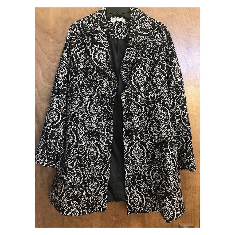 Black and white brocade-style coat